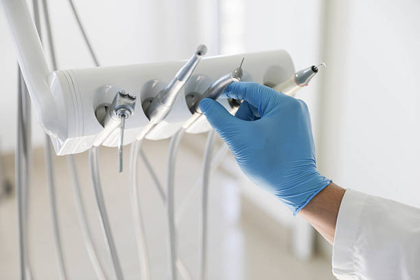 Professional Tooth Extraction technician working in Gladstone, OR